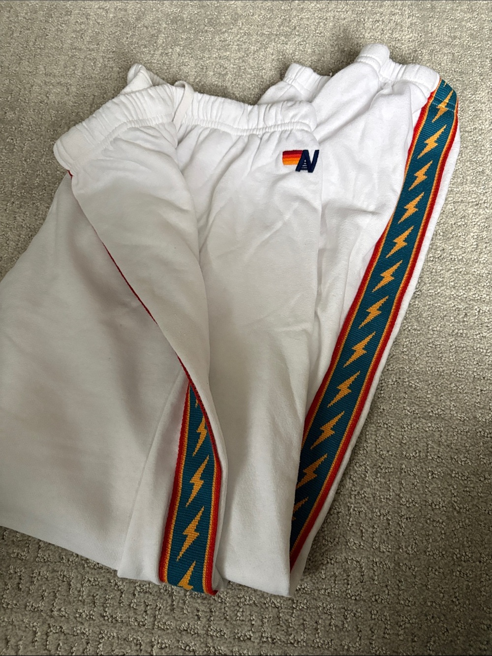 Aviator Nation White Sweatpants with Teal & Yellow Bolt Side Tape